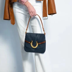 HAMPTON ROAD DESIGNS HUNTER BLUE HANDBAG 12 HAMPTON ROAD DESIGNS HUNTER BLUE HANDBAG -Johny Clothing Shop NavyHunteronModel2 700x.progressive fc25336e b172 4010 9f4d 4b79f63524b7